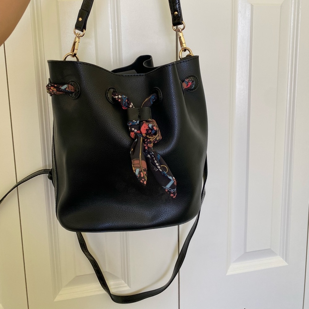 Tote with attached wristlet inside